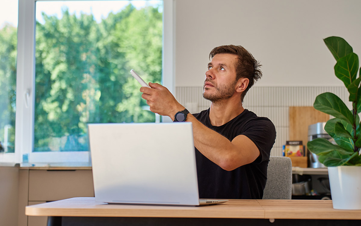 ductless hvac, man at computer comparing options